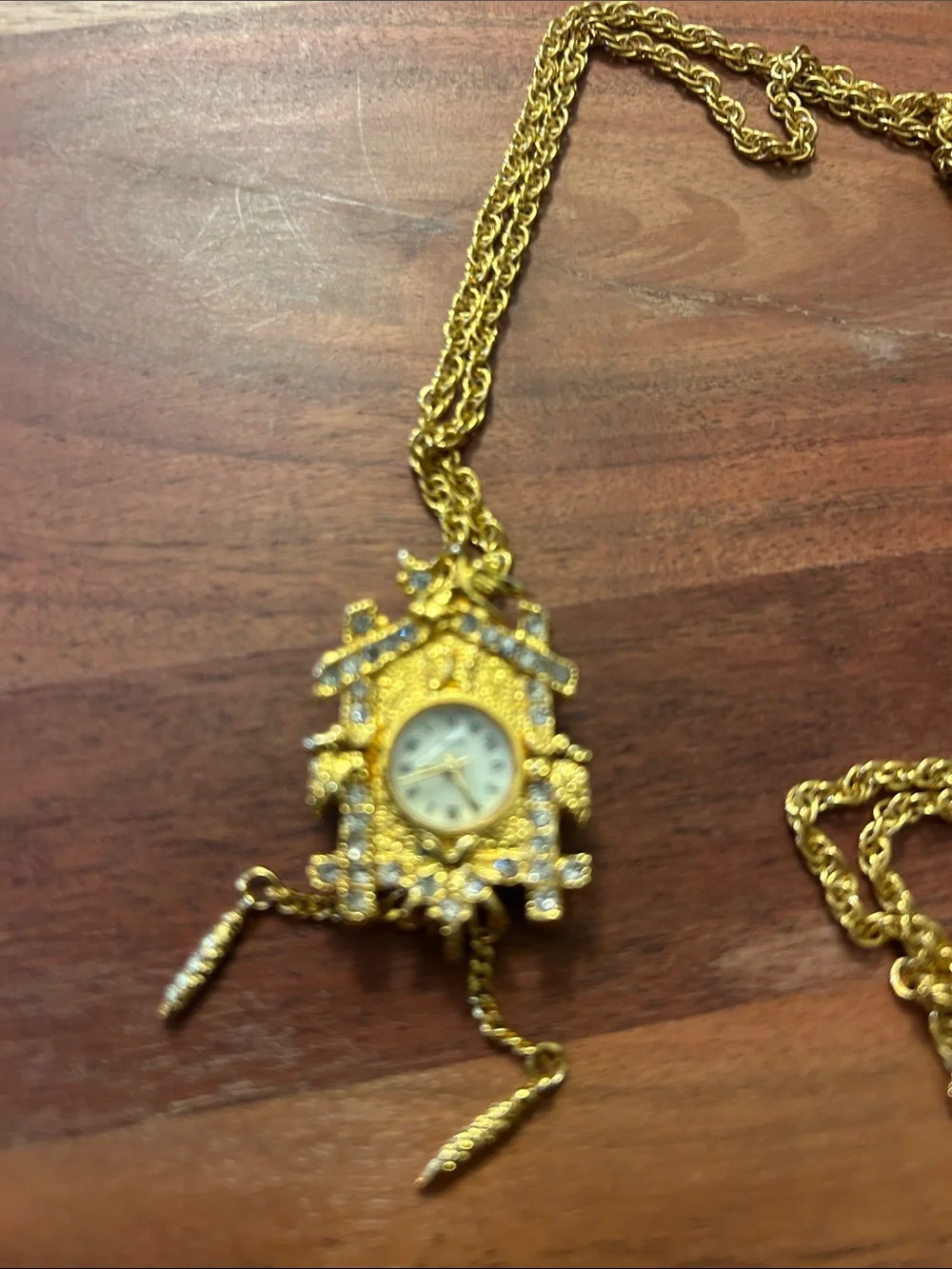 W. Lind vintage gold-tone cuckoo clock pendant watch necklace 28”